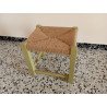 Set of two restored wooden stools with a distressed green finish and woven jute seats